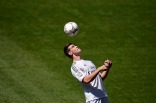 Gareth Bale of Wales heads a ball at the Santiago Bernabeu stadium in Madrid