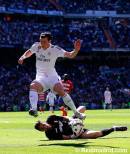 Bale leaps over the keeper