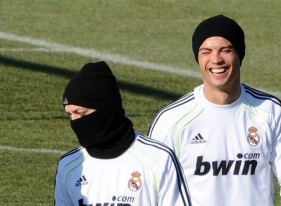 Real Madrid's Portuguese forward Cristiano Ronaldo (R) and Real Madrid's German midfielder Mesut Ozil take part in a training session at Real Madrid Sport City in Madrid on February 1, 2011. AFP PHOTO/DOMINIQUE FAGET (Photo credit should read DOMINIQUE FAGET/AFP/Getty Images)