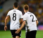 TOPSHOT - Germany's defender Shkodran Mustafi (R) celebrates with Germany's midfielder Mesut Oezil after scoring a goal during the Euro 2016 group C football match between Germany and Ukraine at the Stade Pierre Mauroy in Villeneuve-d'Ascq near Lille on June 12, 2016. / AFP / MARTIN BUREAU (Photo credit should read MARTIN BUREAU/AFP/Getty Images)